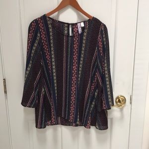 Francesca’s patterned flowy blouse